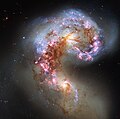 Les galaxies des Antennes, une paire de galaxies en interaction allant probablement fusionner dans 400 millions d'années.