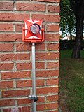 Prisme réflecteur avec sa bulle de niveau sphérique