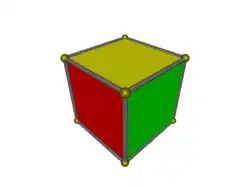 Trois losanges déformés inscrits dans un hexagone (rouge, jaune et vert).
