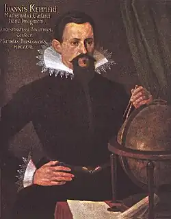Portrait « de Strasbourg » complété (compas, globe).