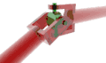 Dans un joint de Cardan, le croisillon (en vert) met les deux arbres (en rouge) en situation équivalente à une liaison directe par rotule à doigt.