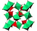 Structure cristalline de ZrW2O8. Octaèdres ZrO6 en vert, tétraèdres WO4 en rouge.
